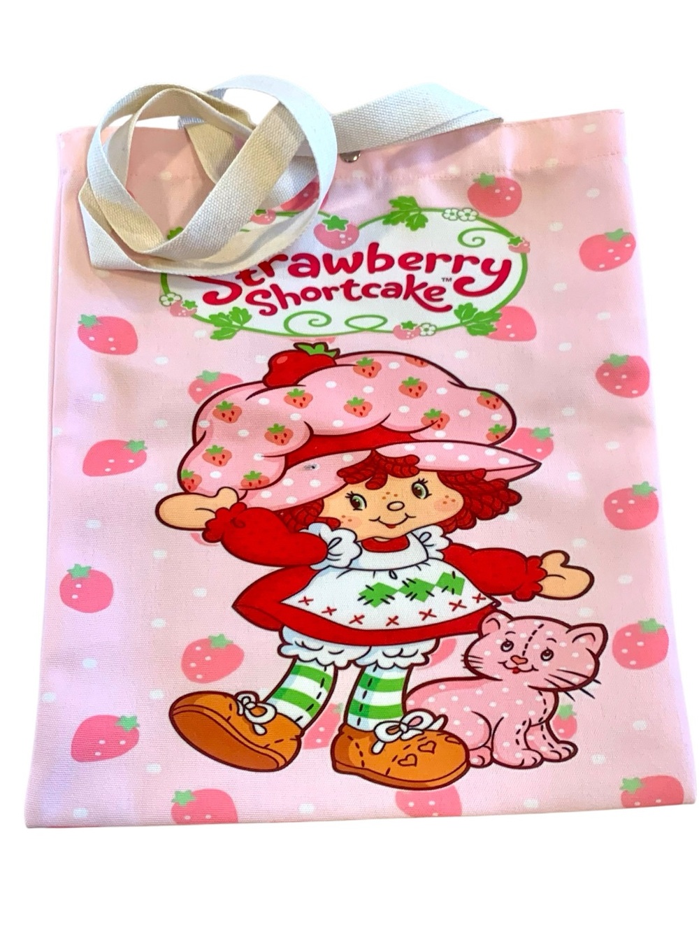 Strawberry Shortcake and her puppy, Pupcake adorable and adorable tote bag